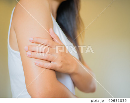 Closeup female's arm. Arm pain and injury. 40631036