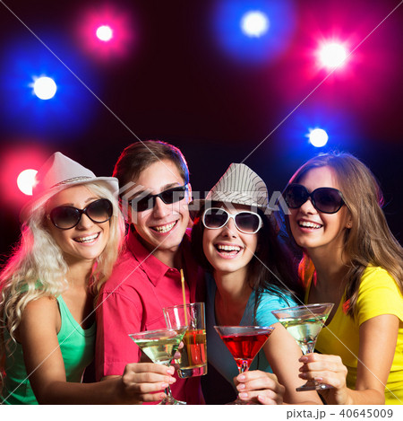 Young friends touching the glasses with each other 40645009