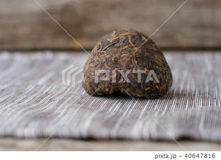 Chinese old Shen Puer in the shape of a nest Chinese old Shen Puer in the shape of a nest 40647816