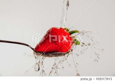 Washing a Strawberry Washing a Strawberry 40647843