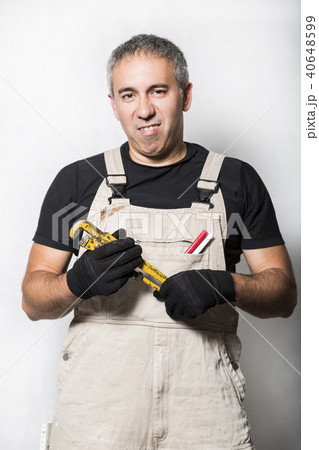worker specialist plumber, engineer or constructor 40648599