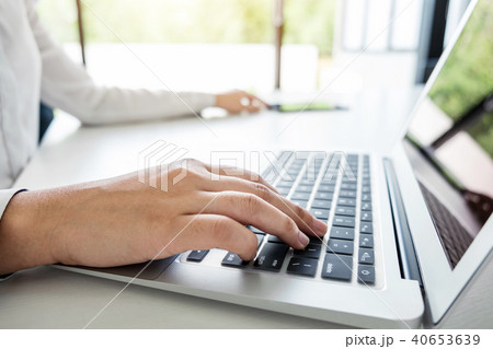 Business woman working and using laptop computer, digital tablet 40653639