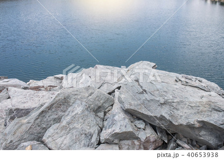 Stone with lake with sunlight,Nature background Stone with lake with sunlight,Nature background 40653938