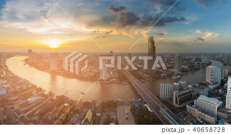 Sunset skyline over river curved Bangkok city Sunset skyline over river curved Bangkok city 40658728