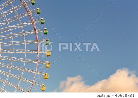 Path of giant funfair wheel with blue sky Path of giant funfair wheel with blue sky 40658731