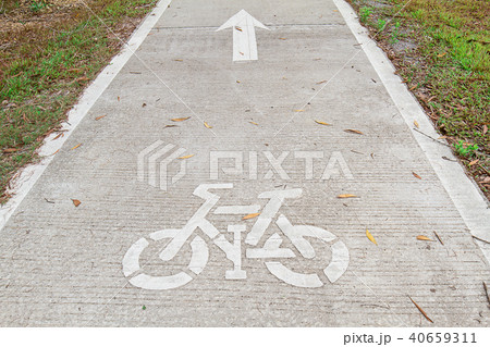 bicycle sign painted on the bike lane in the park bicycle sign painted on the bike lane in the park 40659311