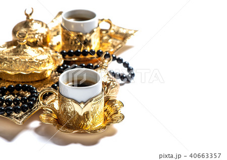 Coffee cups rosary beads white background Islamic 40663357