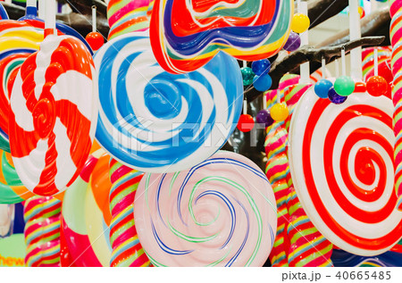Round lollipops in candy shop. Sweets background Round lollipops in candy shop. Sweets background 40665485