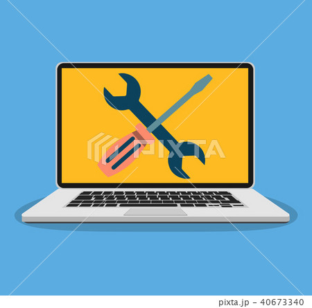 Laptop with wrench and screwdriver on screen. 40673340