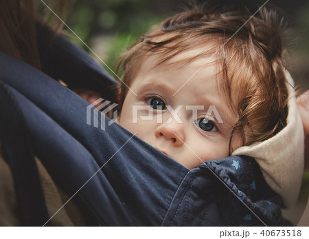 little baby in carrier with mother at outdoor 40673518