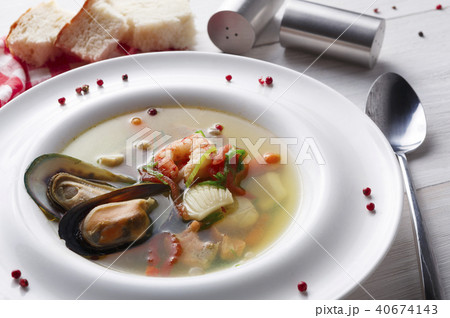 Healthy homemade seafood soup of white fish, shrimps and mussels Healthy homemade seafood soup of white fish, shrimps and mussels 40674143