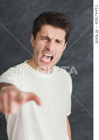 Portrait of young angry man 40674451
