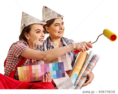 Repair home women holding Bank with paint for wallpaper. 40674639