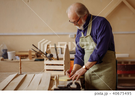 measure thrice and cut once. elderly male earning money for leaving 40675495