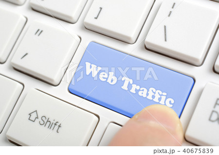 Pressing blue web traffic key on keyboard Pressing blue web traffic key on keyboard 40675839