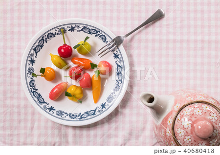 Sweet dessert in fruit shape on dish Sweet dessert in fruit shape on dish 40680418