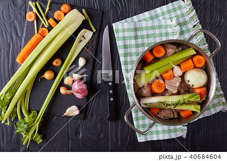 ingredients for veal stew in a pot 40684604