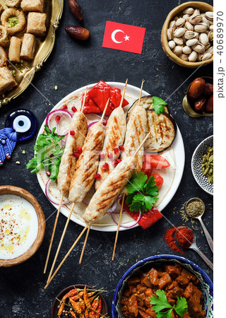 Traditional turkish kebab or kabob, turkish sweets, yogurt sauce and roasted vegetables 40689970