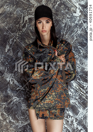 beautiful model in military jacket posing 40691754