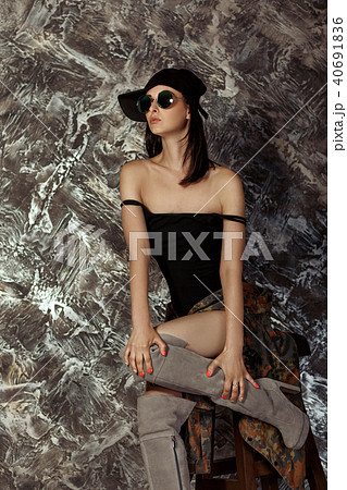 beautiful model in military jacket posing beautiful model in military jacket posing 40691836