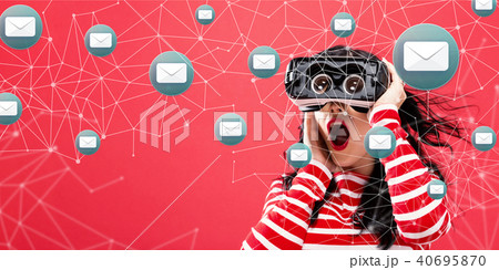 Emails with woman using a virtual reality headset Emails with woman using a virtual reality headset 40695870
