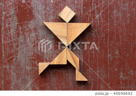 Tangram puzzle in joyful man running shape 40698692