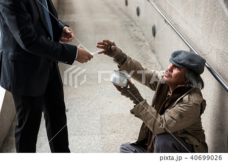 Old homeless man in town, Help concept 40699026