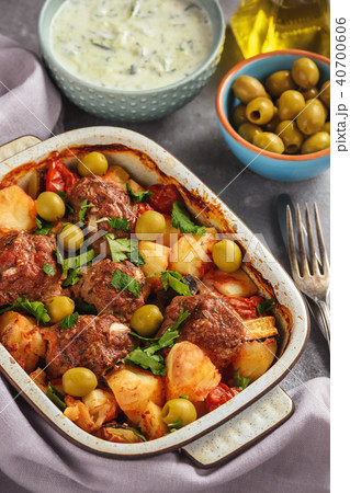Kofte , beef meatballs, baked with vegetables. 40700606
