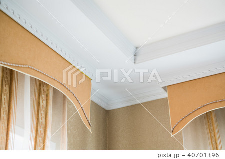 stucco on the ceiling and curtains in rich apartment stucco on the ceiling and curtains in rich apartment 40701396