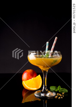 Frozen cocktail smoothie Margarita on a black glass background, Frozen cocktail smoothie Margarita on a black glass background, 40701529