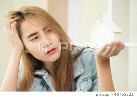 Young woman planning to buy a house. Young woman planning to buy a house. 40705522