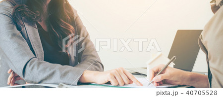 Client Signs Document to Buy House and Real Estate 40705528