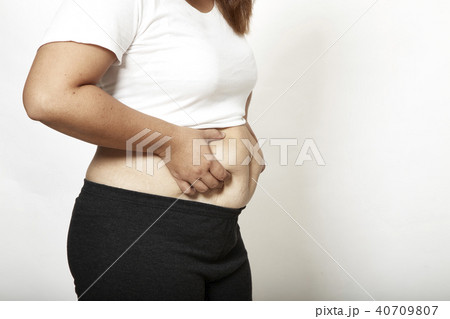 Asian Woman measuring fat 40709807