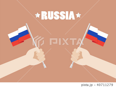 Hands holding up Russia flags 40711279