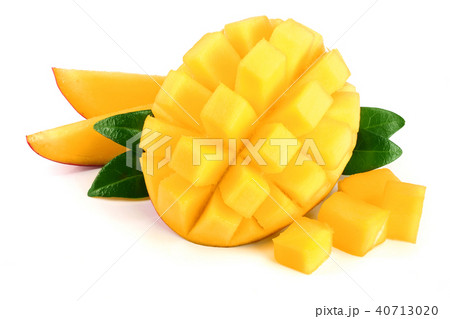 Mango fruit half with leaves and slices isolated on white background close-up 40713020