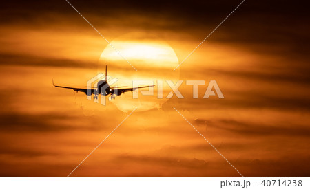 Beautiful sunset with airplane. Travel concept Beautiful sunset with airplane. Travel concept 40714238