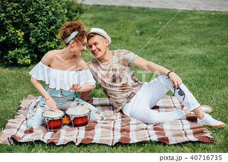 Young laughing couple playing drums 40716735