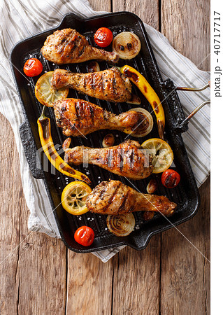 Freshly cooked grilled chicken drumstick legs Freshly cooked grilled chicken drumstick legs 40717717