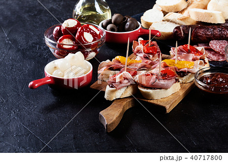 Spanish tapas with slices jamon serrano 40717800