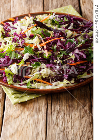 Delicious organic salad of white and red cabbage Delicious organic salad of white and red cabbage 40717852