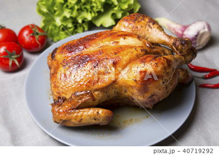 Chicken baked whole. 40719292