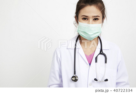 Cheerful happy doctor with mask 40722334