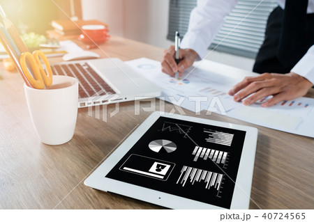 Businessman hand working with financial data 40724565