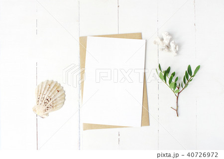 Summer marine stationery, desktop mock-up scene. Blank greeting card, craft envelope, seashell 40726972