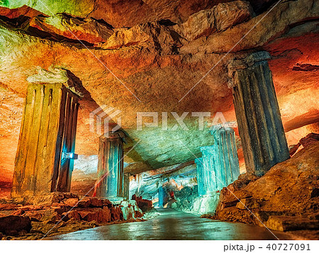 Wonderful Prometheus Cave. Stalactites and stalagmites in the illuminated cave 40727091