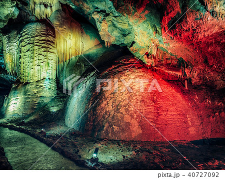 Wonderful Prometheus Cave. Stalactites and stalagmites in the illuminated cave 40727092
