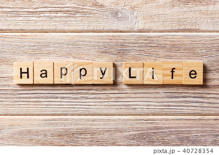 happy life word written on wood block. happy life word written on wood block. 40728354