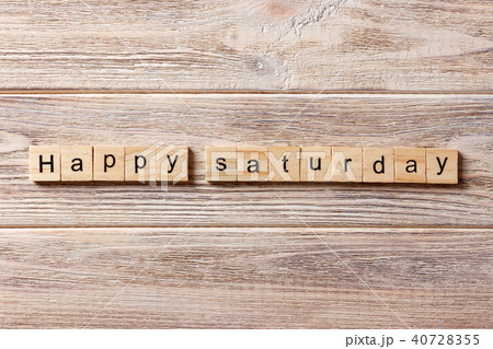 Happy Saturday word written on wood block. Happy Saturday word written on wood block. 40728355