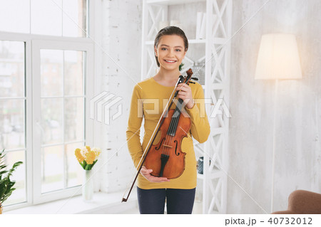 Amazing brunette going to play music 40732012