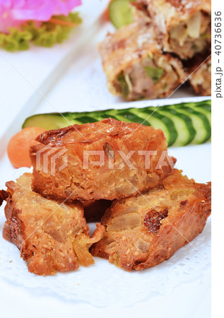Deep fried bean curd skin stuffed with kumquat  40736636
